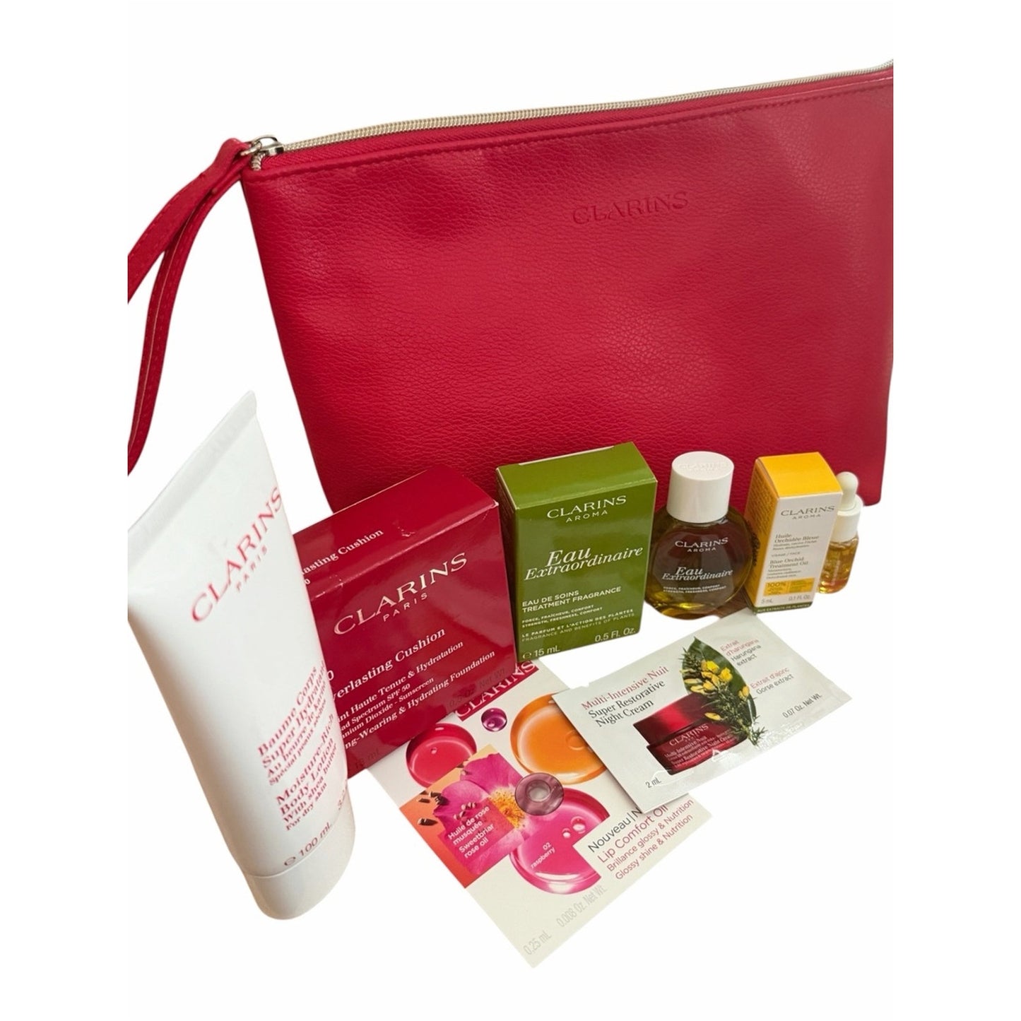 Clarins Gift Set w Red Clarins Bag W Eau Extraordinaire, SPF Cushion, Lotion +