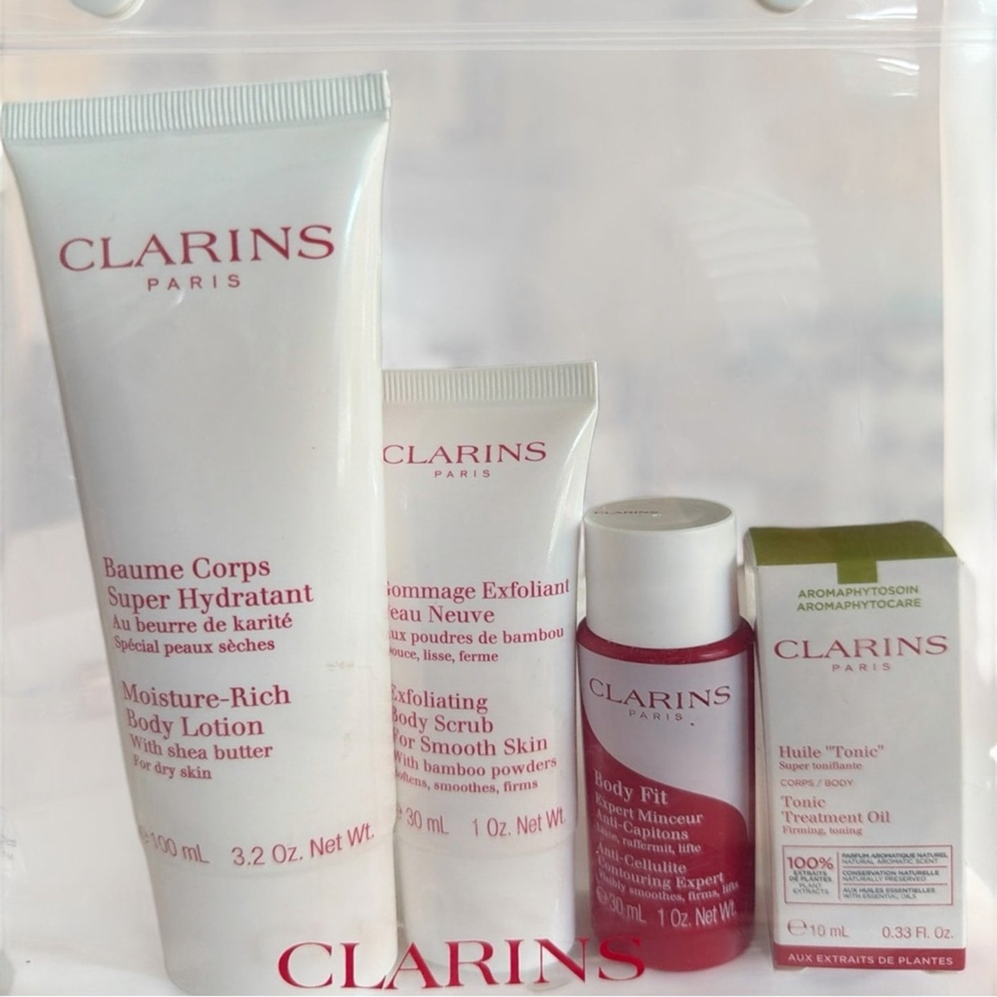 Clarins Body Care Gift Set Full Size Lotion + Scrub + Body Fit + Oil + Pouch NEW