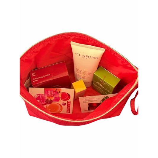 Clarins Gift Set w Red Clarins Bag W Eau Extraordinaire, SPF Cushion, Lotion +