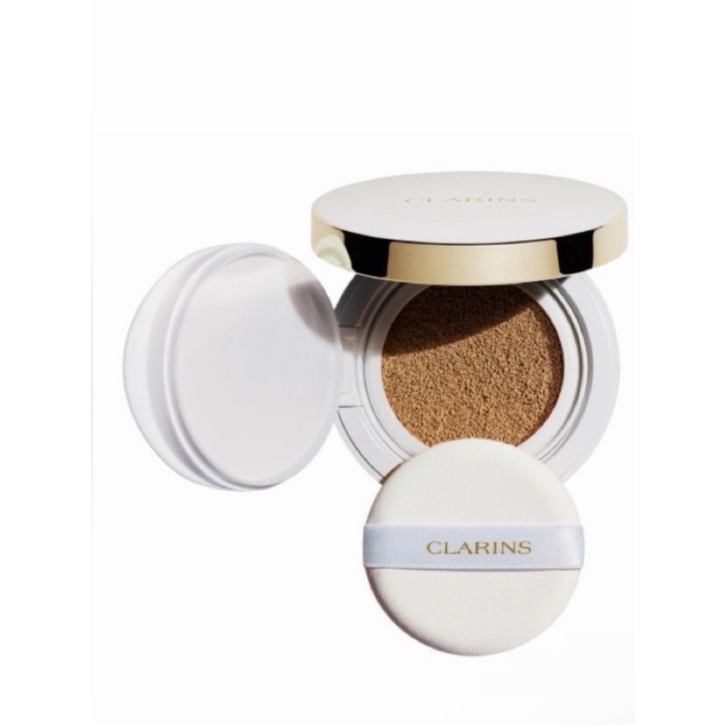 Clarins Gift Set w Red Clarins Bag W Eau Extraordinaire, SPF Cushion, Lotion +